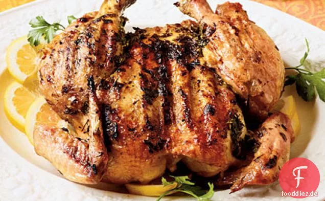 Huhn unter einer Pfanne