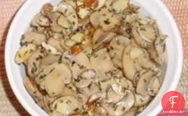 Gebackener Brie mit Pilzen und Mandeln
