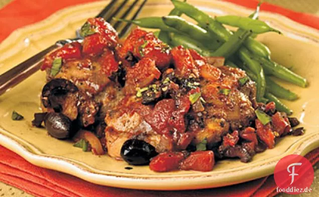Hähnchenschenkel mit Tomaten und Oliven
