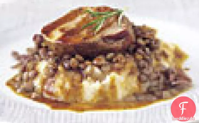 Gewürztes Schweinefleisch mit Selleriewurzelpüree und Linsen