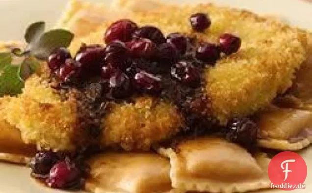 Truthahn-Jakobsmuscheln und Squash-Ravioli mit Cranberry-brauner Butter