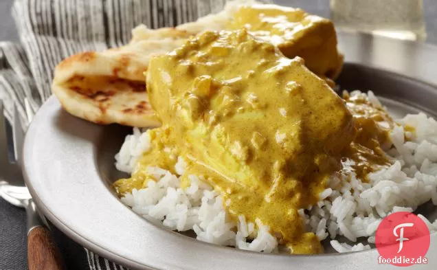 Cremiges indisch gewürztes Heilbutt-Curry