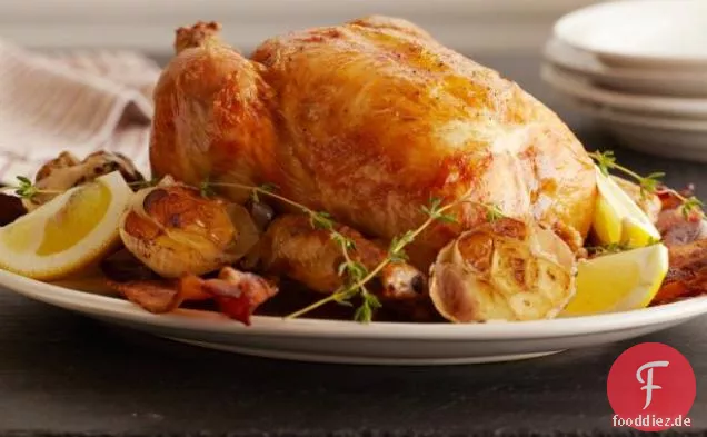 Gebratenes Hähnchen mit Zitrone und Knoblauch