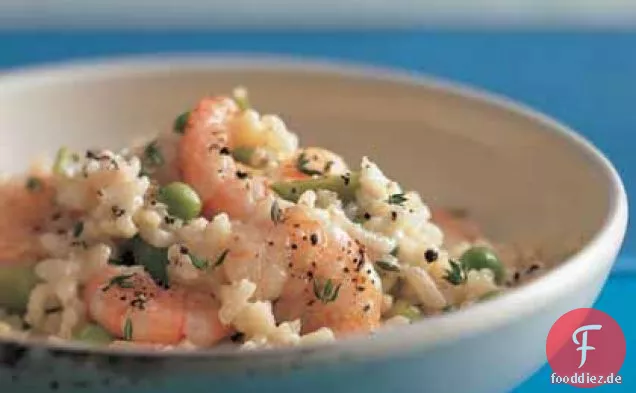 Risotto mit Schnee Erbsen und Garnelen