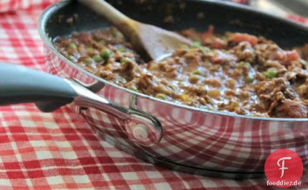 Curry-Hackfleisch und Erbsen