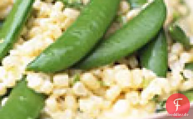 Cremiger Mais mit Zucker, Erbsen und Schalotten