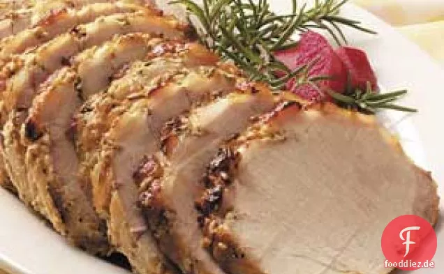 Dijon-geriebenes Schweinefleisch mit Rhabarbersauce