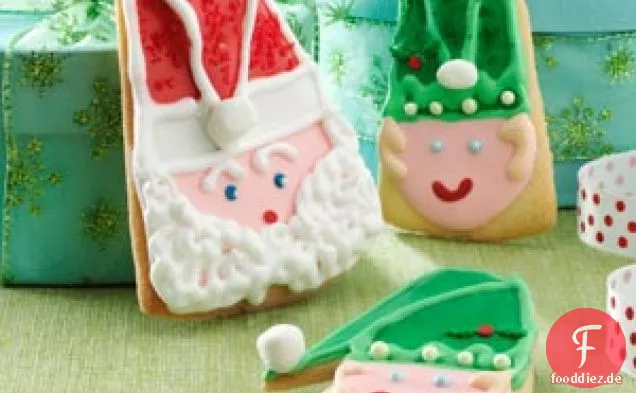 Weihnachtsmann und Elf Weihnachtsplätzchen