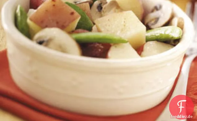 Kartoffeln mit Pilzen und Erbsen