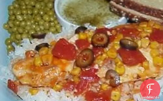 Tilapia mit Tomaten, schwarzen Oliven und Mais