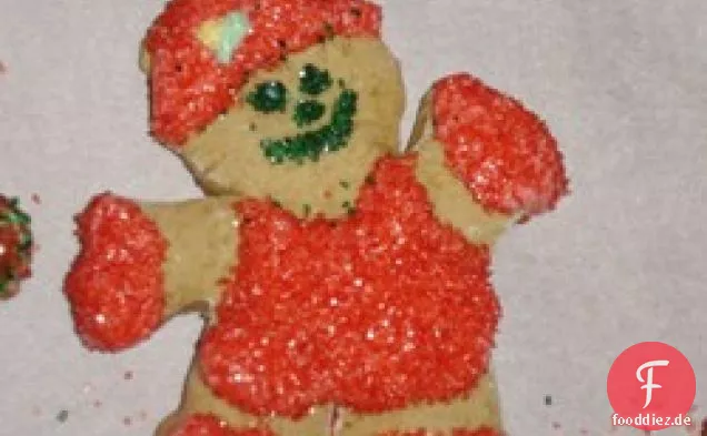 Brauner Zucker ausgeschnittene Kekse und Zuckerguss