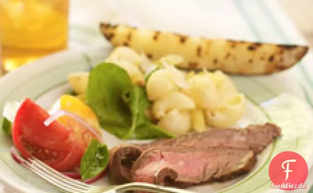 Gegrilltes Flankensteak mit Jakobsmuscheln