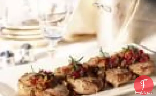 Schweinekoteletts mit gerösteter Schalotte, Tomate und Rosmarin Relish