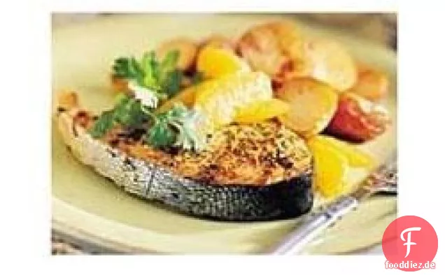 Im Ofen gebratene Lachssteaks mit roten Kartoffeln
