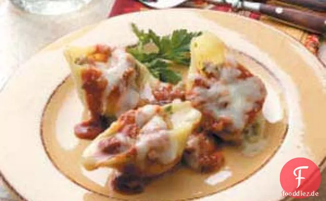 Mit Wurst gefüllte Muscheln