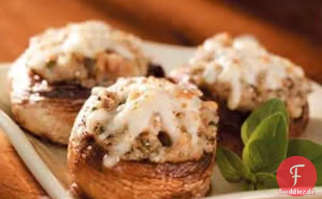 Mit Muscheln gefüllte Champignons