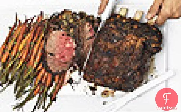 Stehender Rippenbraten, Spinat-Steinpilz-Füllung, irische Whiskey-Soße und Meerrettichcreme
