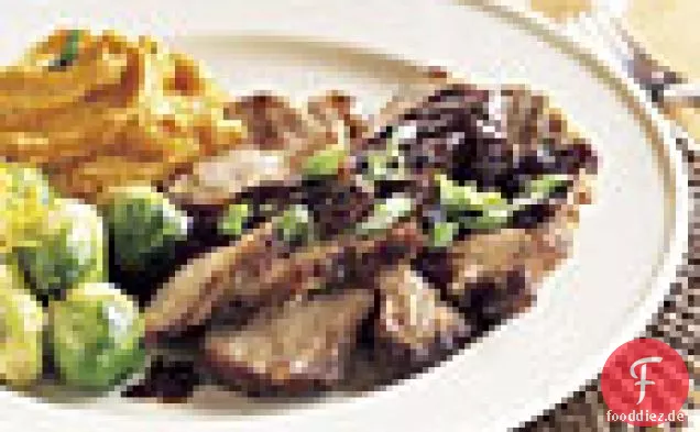 Langsam gekochter Hoisin Schweinebraten mit grünen Zwiebeln