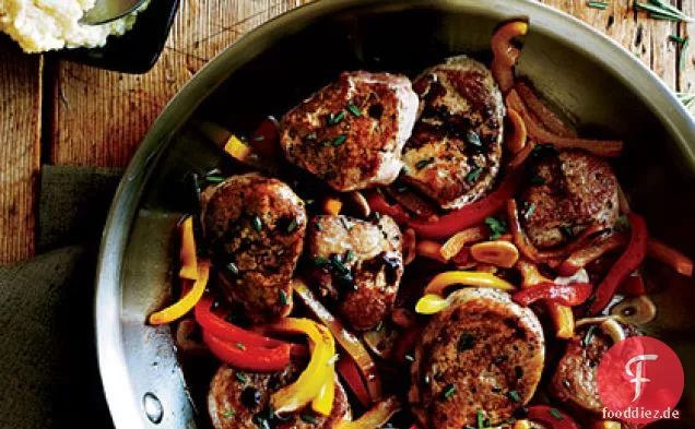 Schweinefilet mit roten und gelben Paprika