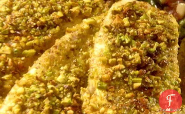 Pistazienkrustete Tilapia mit Mangold, gebratenem Schinken, Gorgonzola und Pinienkernen
