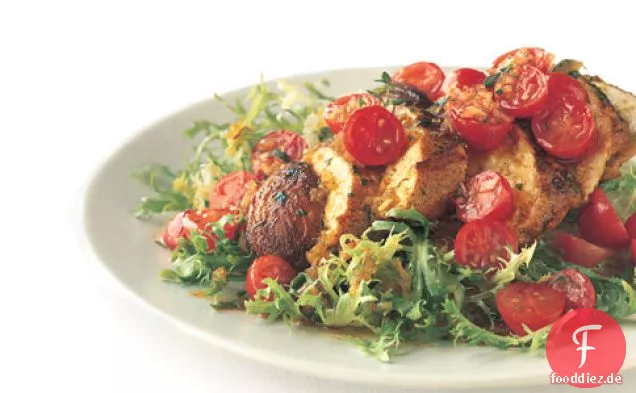 Gebratenes Hähnchen mit Tomaten-Safran-Vinaigrette auf Frisée