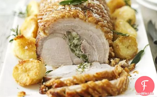 Gebratene Schweinelende mit Kräuterbutter-Füllung und Braten