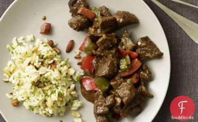 Curry-Pfeffer-Rindfleisch mit geräuchertem Mandel-Pilaw