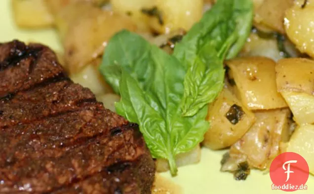 Kreuzkümmel gerieben Sirloin mit Basilikum Bratkartoffeln