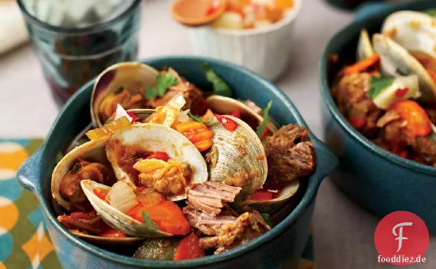 Geschmortes Schweinefleisch mit Muscheln
