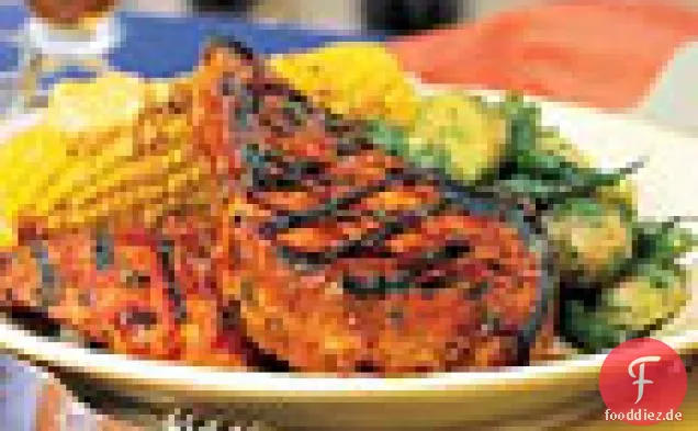 Gegrilltes Hähnchen und Schweinefleisch mit Orangen-Kreuzkümmel-Glasur
