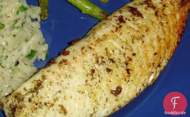 Weißer Fisch In Kräuterbutter