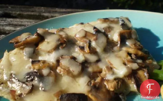 Fischgratin mit Champignons