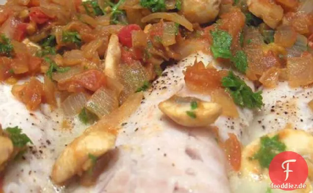 Barsch- oder Schnapperfilet mit Tomaten und Zwiebeln