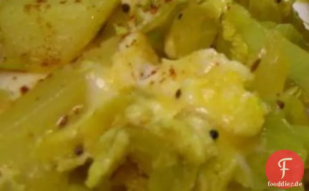 Kohl und Kartoffel braten