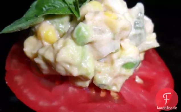 Fiesta Maissalat über Tomate