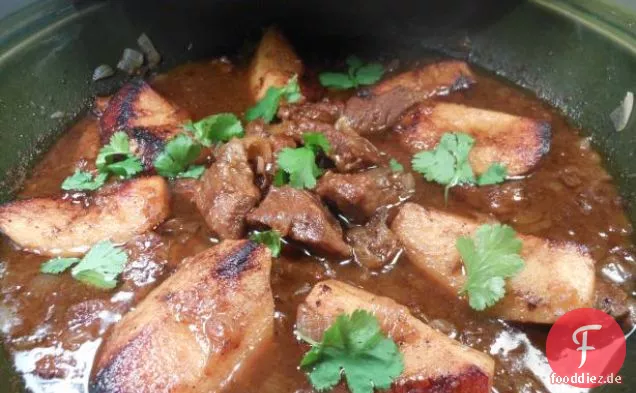 Bitterschokolade Lammkoteletts mit sautiertem Spinat