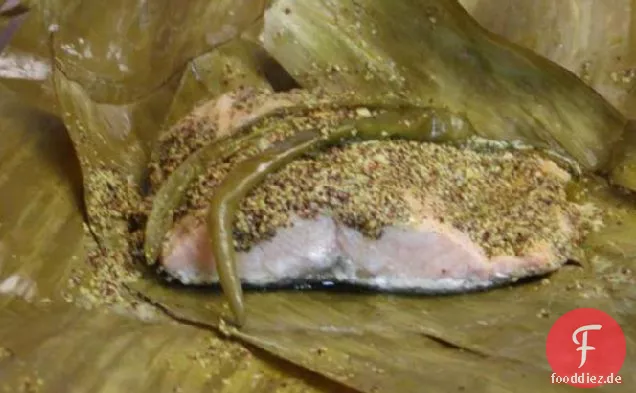 Fisch in Bananenblättern gedämpft